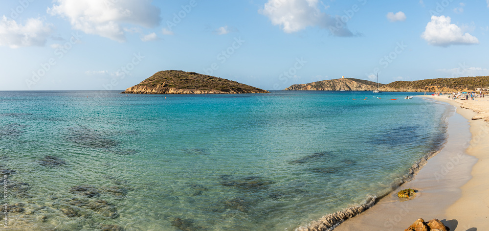 Aerial view of Tuerredda bay with the beach of fine sand and transparent blue and turquoise water
