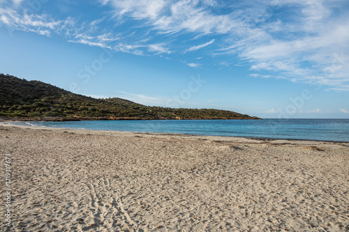 The beach of Sa Perda Longa in Sardigna with turquoise and blue water photo