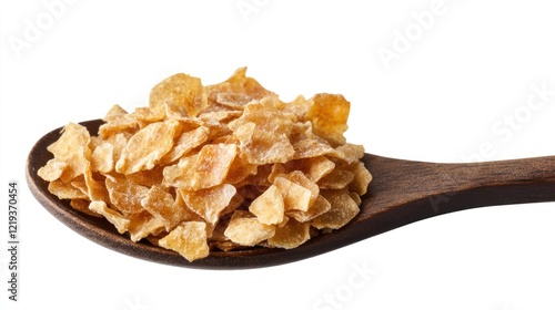Golden Crispy Cereal Flakes in Wooden Spoon