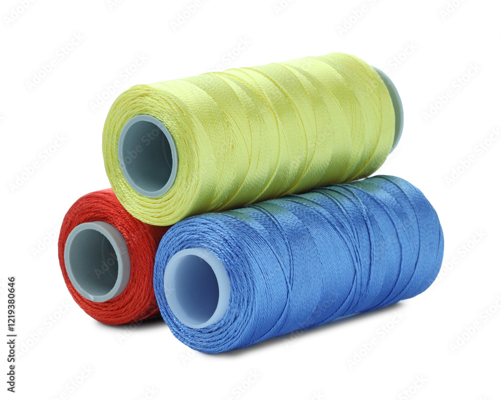 Spools of bright sewing threads isolated on white Spools of bright sewing threads isolated on white