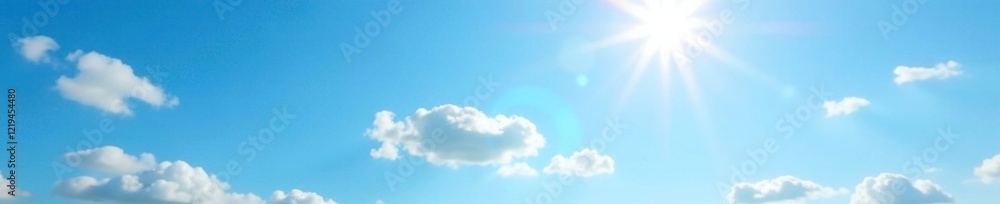 Obraz premium Blue sky with wispy white clouds and sun shining through the atmosphere, blue, soft, photography