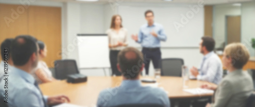 Blurred background of a confident speaker explaining project strategies during a team presentation in a modern office, wide