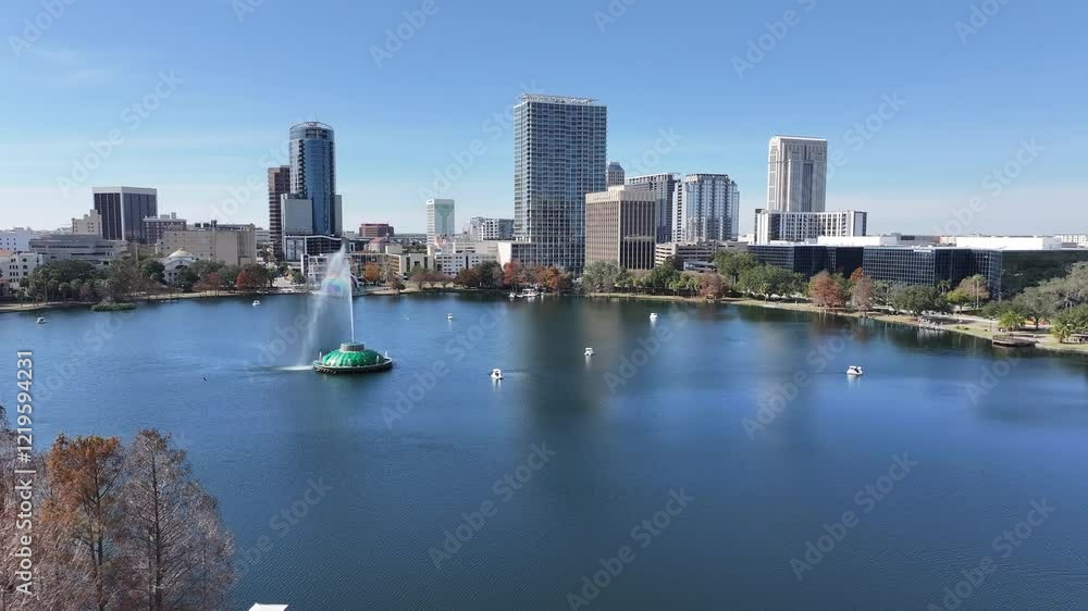 Eola Park At Orlando In Florida United States. High Rise Buildings Landscape. Financial District. Orlando At Florida United States. Downtown City. Urban Outdoor. Eola Park At Orlando In Florida United States. High Rise Buildings Landscape. Financial District. Orlando At Florida United States. Downtown City. Urban Outdoor.