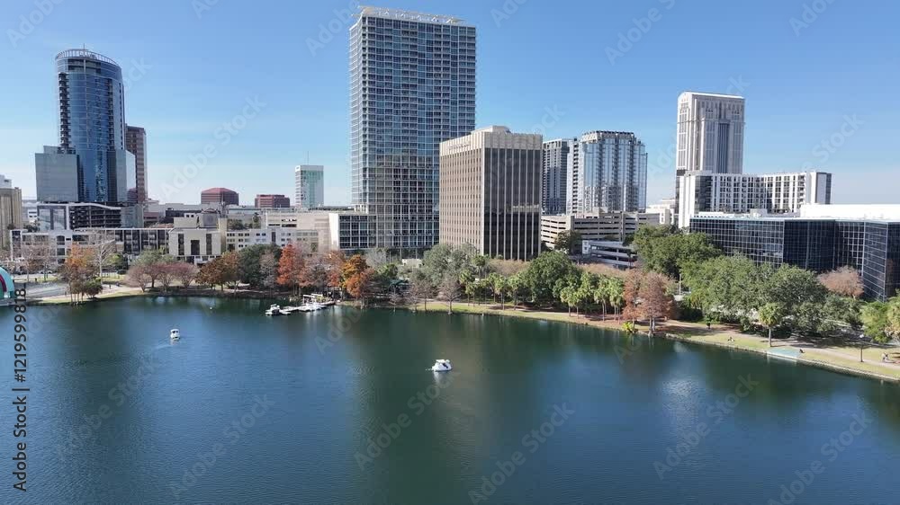 Eola Park At Orlando In Florida United States. High Rise Buildings Landscape. Financial District. Orlando At Florida United States. Downtown City. Urban Outdoor. Eola Park At Orlando In Florida United States. High Rise Buildings Landscape. Financial District. Orlando At Florida United States. Downtown City. Urban Outdoor.
