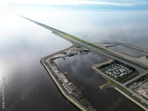 The Afsluitdijk, a famous dyke in the North of Holland, seperating the Ijssel lake from the Wadden Sea, The Netherlands photo