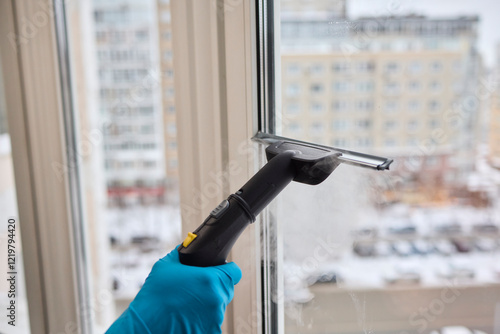 Winter Window Cleaning performed with a Squeegee for optimal results and clarity photo