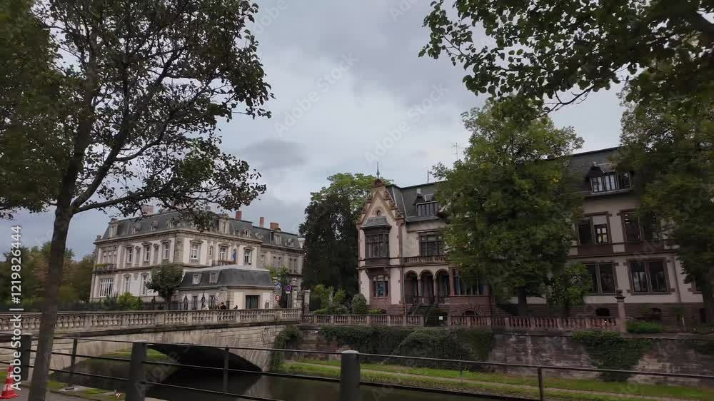 Street view around the old town of the city Strasbourg in France on a cloudy day. Street view around the old town of the city Strasbourg in France on a cloudy day.