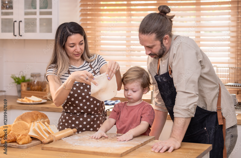 Family enjoys baking together in a cozy kitchen with fresh bread and laughter Family enjoys baking together in a cozy kitchen with fresh bread and laughter