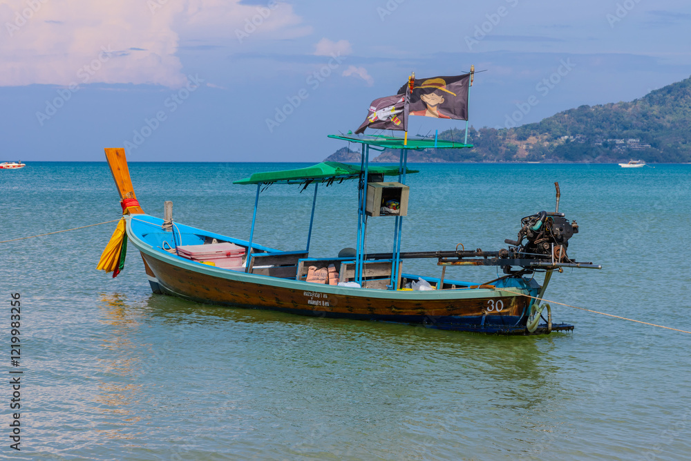 Patong Beach phuket Thailand beautiful turquoise blue waters on the white sand and long tail boats used for tourist Patong Beach phuket Thailand beautiful turquoise blue waters on the white sand and long tail boats used for tourist