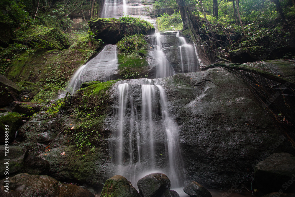 Fototapeta premium Natural waterfall in the interior of the South Kalimantan forest, so cool and still pristine