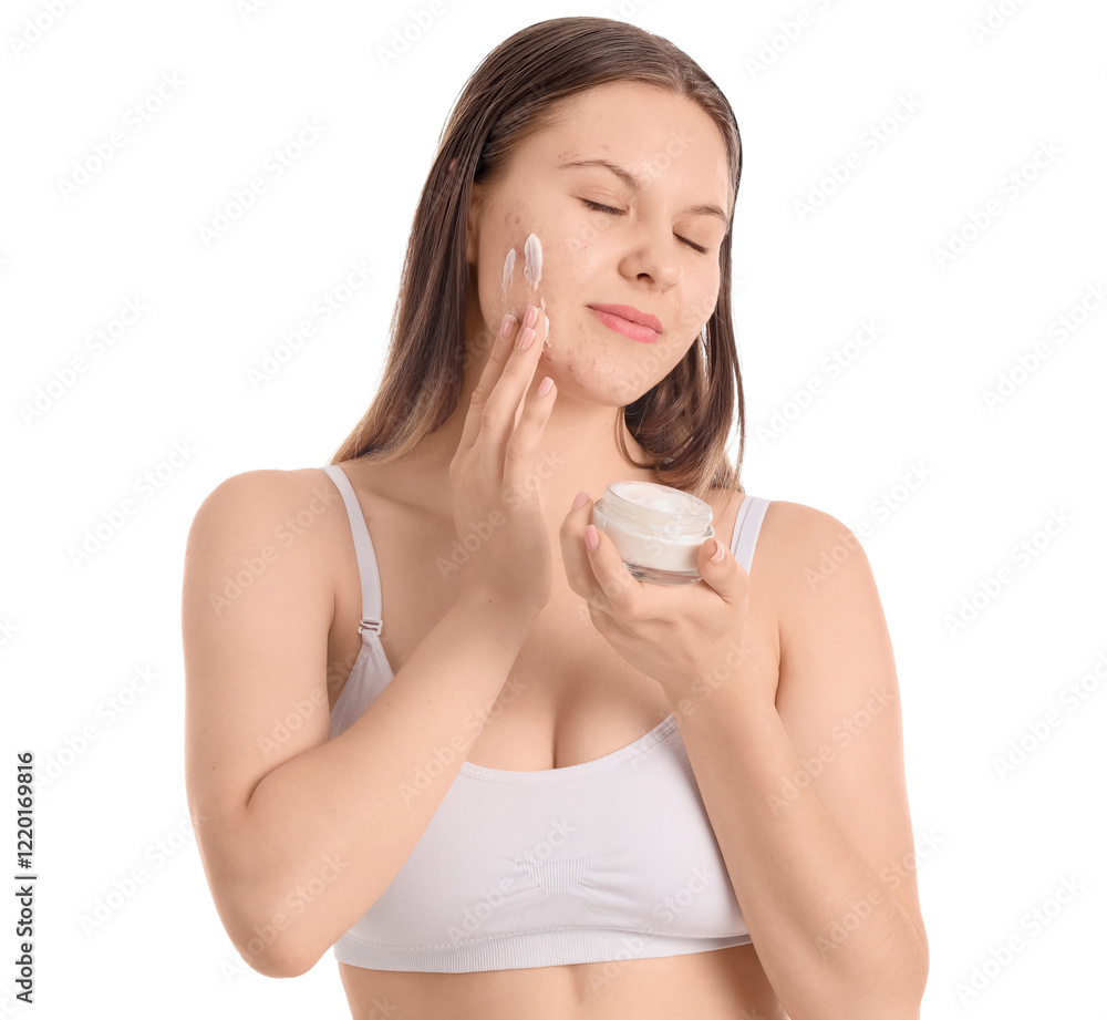 Teenage girl with acne problem applying cream on white background, closeup Teenage girl with acne problem applying cream on white background, closeup