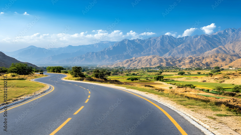 Naklejka premium Winding mountain road journey, scenic valley view, sunny day, travel destination