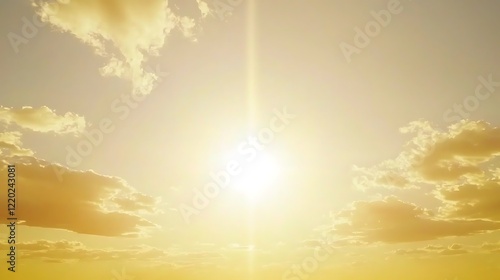 Fototapeta Naklejka Na Ścianę i Meble -  A glowing golden hour sky with the sun casting rich golden and amber tones, gently illuminating faint, scattered clouds across the sky