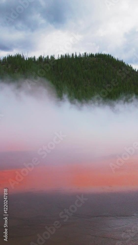 Wallpaper Mural Experience a stunning view of the misty terrain intermixed with vibrant colors at Yellowstone National Park, which perfectly captures the breathtaking beauty and calming tranquility of nature itself Torontodigital.ca