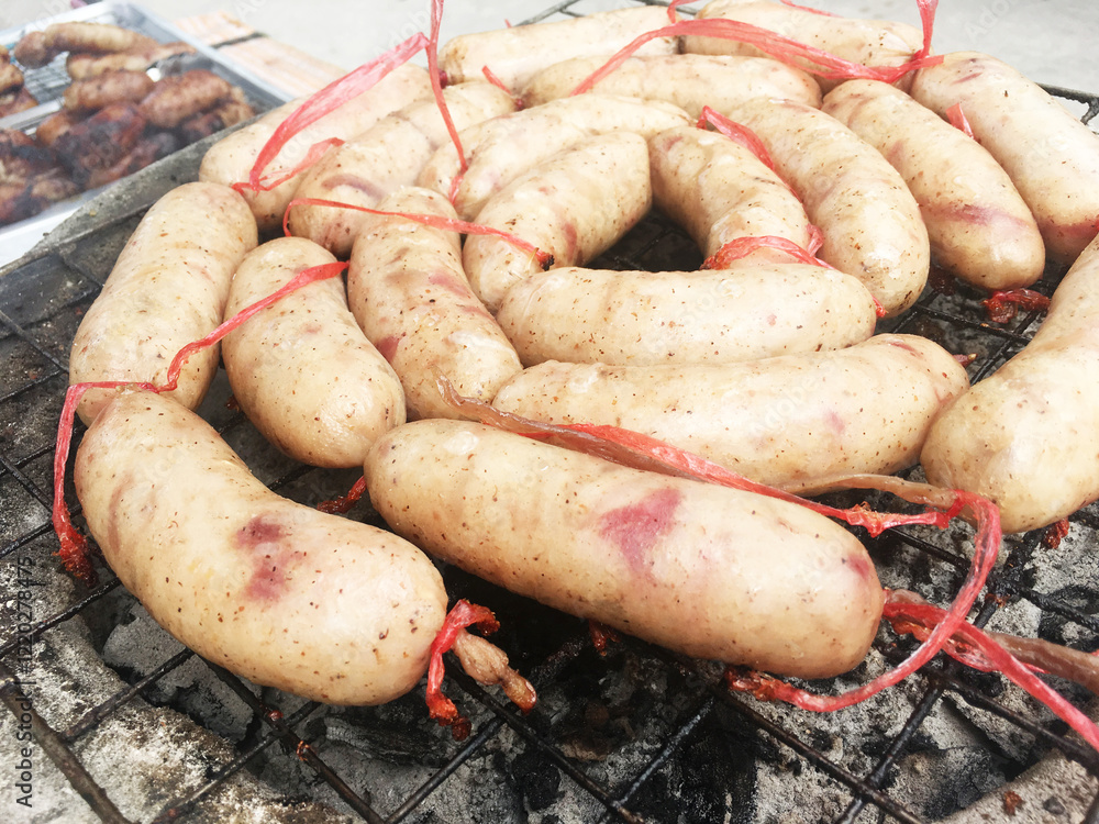 Thai pork sausage, roasted on the stove. Selective focus the image Thai pork sausage, roasted on the stove. Selective focus the image