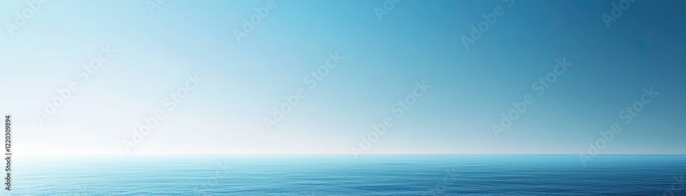 Obraz premium Tranquil Blue Ocean Horizon with Gentle Waves Under a Clear Sky, Perfect for Relaxation and Serenity Themes in Visual Content