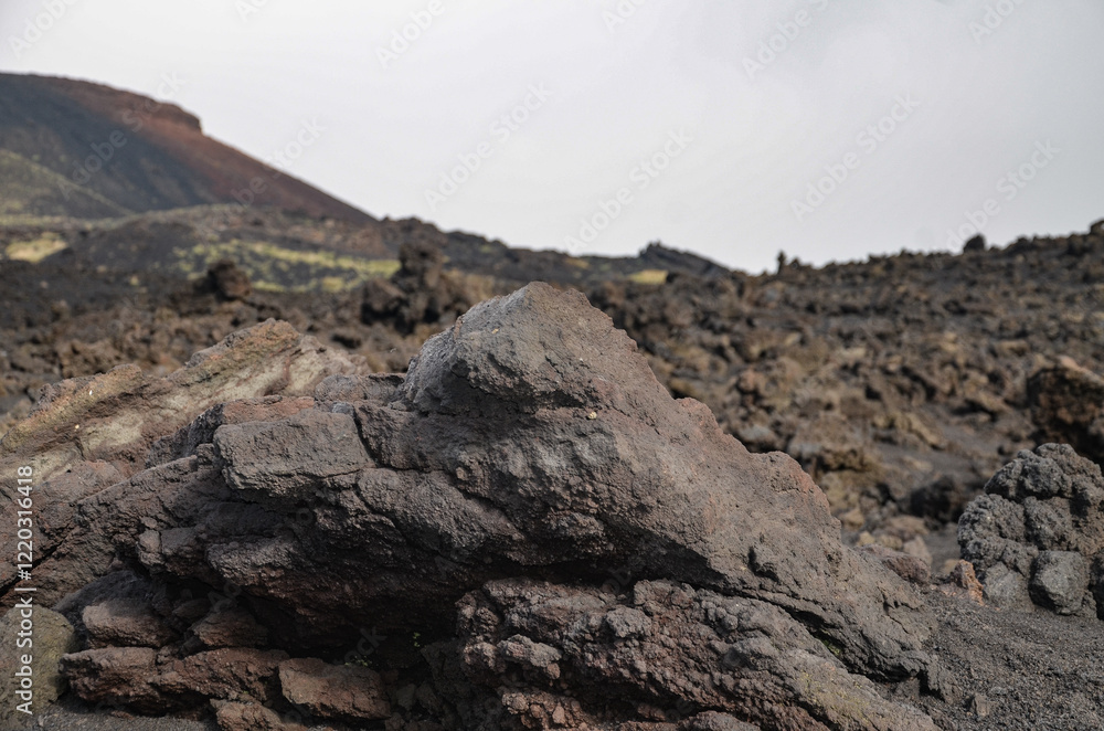 various volcanic stones on the volcano Etna, a distinctive and phenomenal landscape on Mount Etna in Sicily various volcanic stones on the volcano Etna, a distinctive and phenomenal landscape on Mount Etna in Sicily