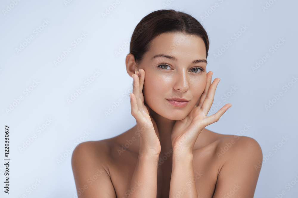 A young woman with flawless, glowing skin gently touches her face, radiating natural beauty and softness. Perfect for skincare, wellness, and beauty concepts, emphasizing health, self-care, and A young woman with flawless, glowing skin gently touches her face, radiating natural beauty and softness. Perfect for skincare, wellness, and beauty concepts, emphasizing health, self-care, and