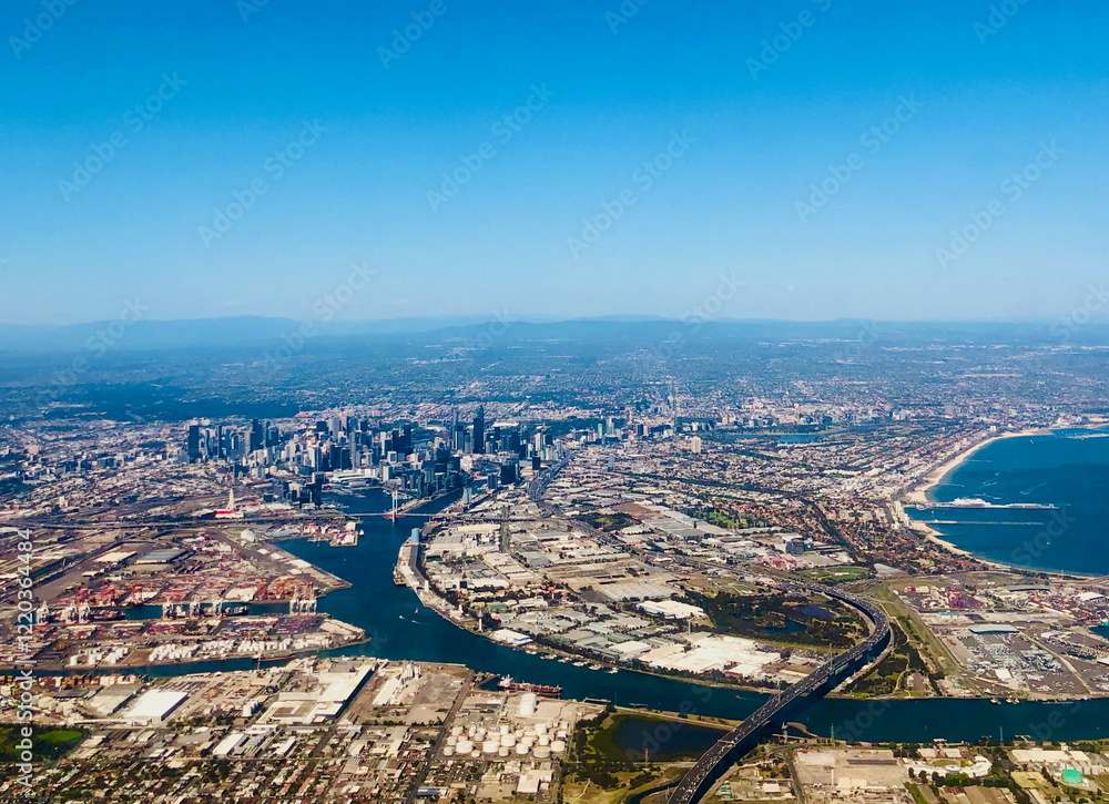Fototapeta premium Aerial view of Melbourne city and Port Phillip Bay, Australia