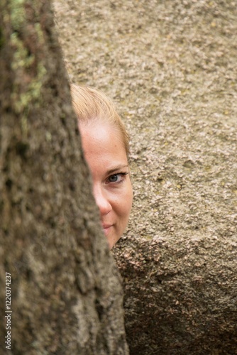 A young white woman travels through the summer of rocks and stones