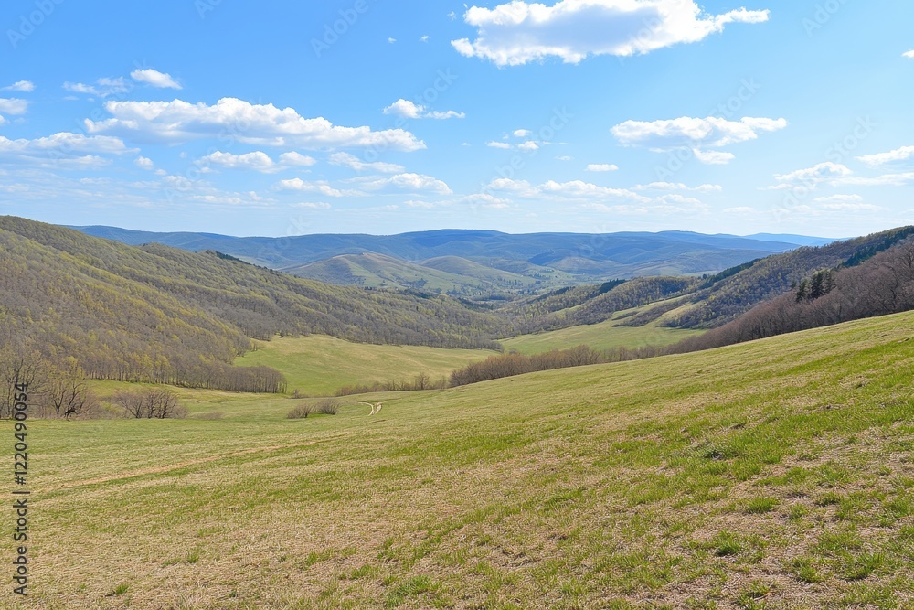 Spring mountain valley landscape, hiking trail, sunny day Spring mountain valley landscape, hiking trail, sunny day