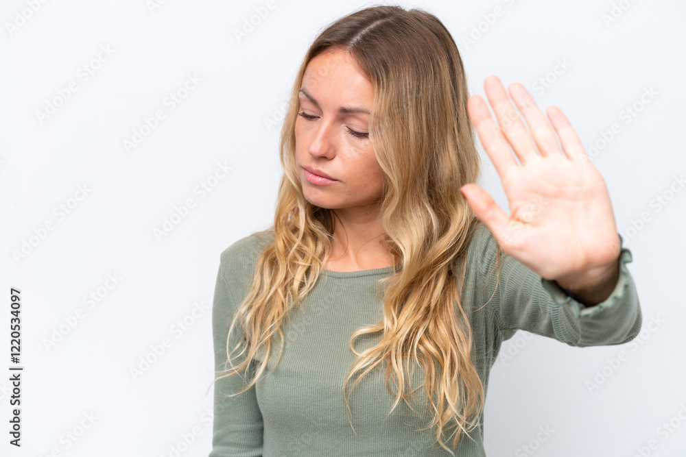 Young Russian woman isolated on white background making stop gesture and disappointed Young Russian woman isolated on white background making stop gesture and disappointed