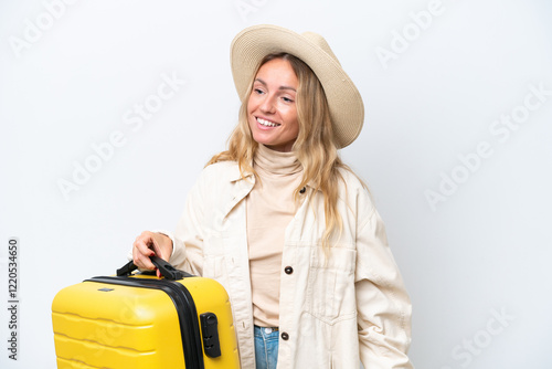 Young Russian woman isolated on white background in vacation with travel suitcase