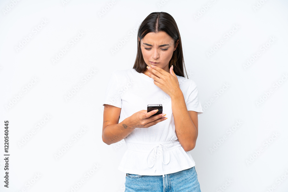 Young caucasian woman isolated on white background thinking and sending a message Young caucasian woman isolated on white background thinking and sending a message