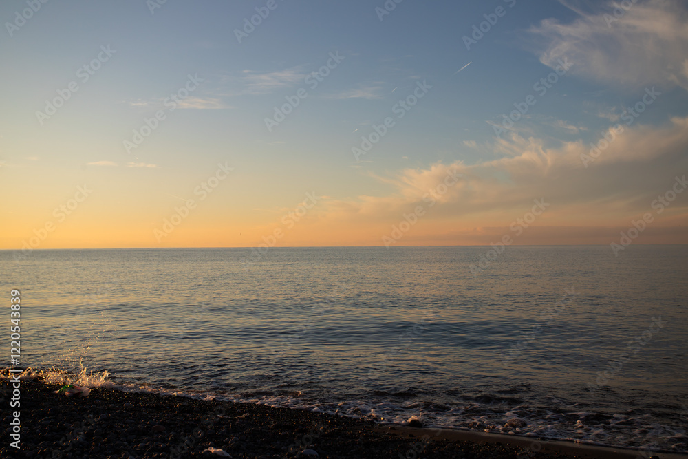 Sunset at sea, ocean waves and sandy beach, tropical vacation and scenic nature. Sunset at sea, ocean waves and sandy beach, tropical vacation and scenic nature.