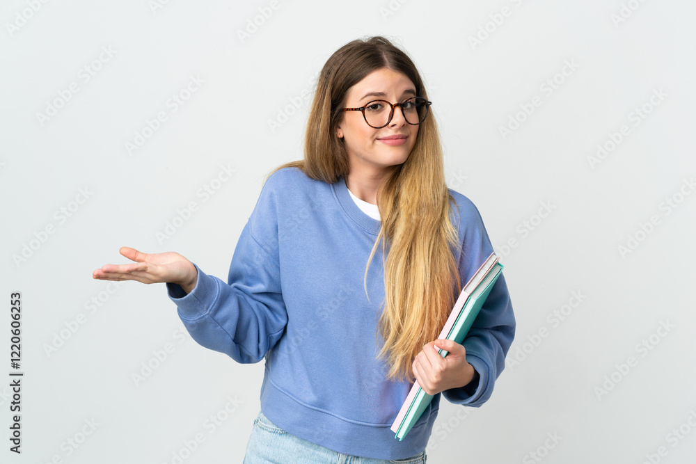 Young blonde student woman isolated on white background having doubts while raising hands Young blonde student woman isolated on white background having doubts while raising hands