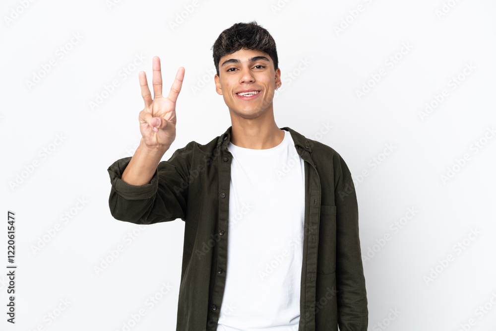 Young man over isolated white background happy and counting three with fingers Young man over isolated white background happy and counting three with fingers