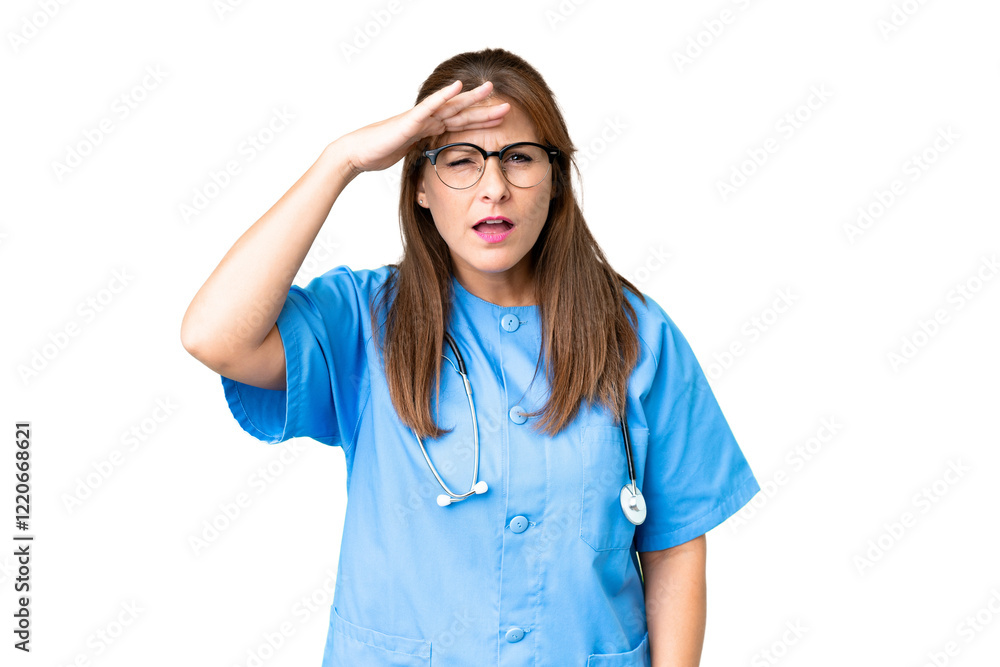 Middle age nurse woman over isolated background looking far away with hand to look something Middle age nurse woman over isolated background looking far away with hand to look something