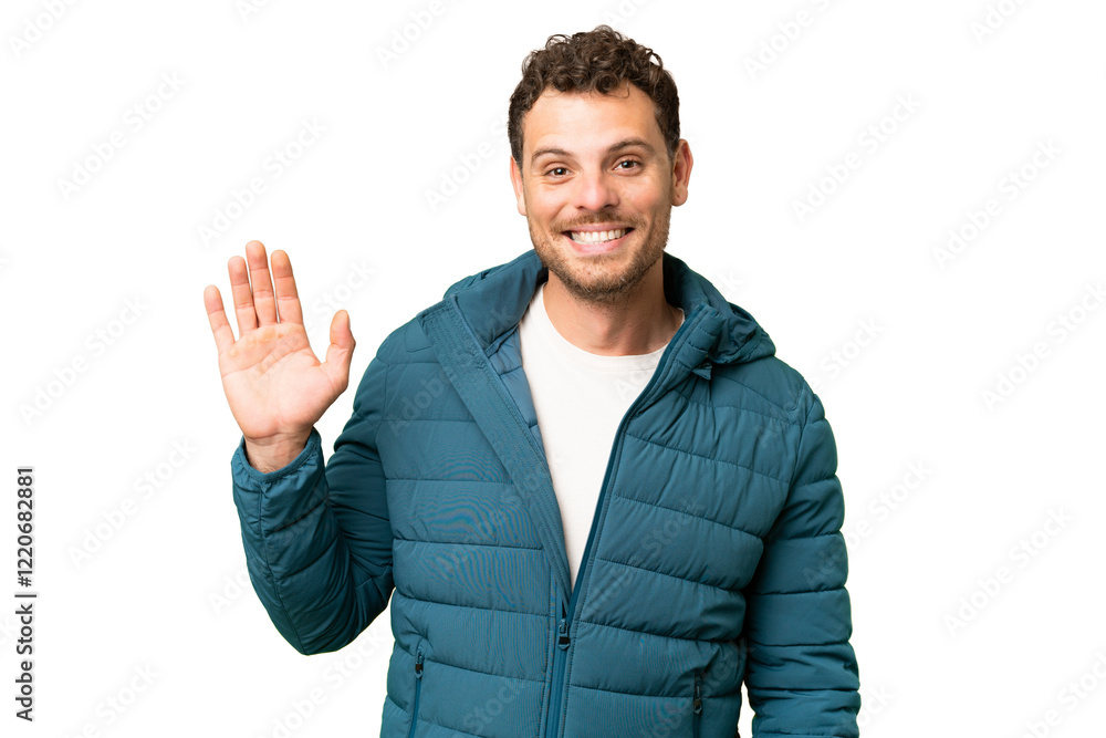 Brazilian man over isolated chroma key background saluting with hand with happy expression Brazilian man over isolated chroma key background saluting with hand with happy expression