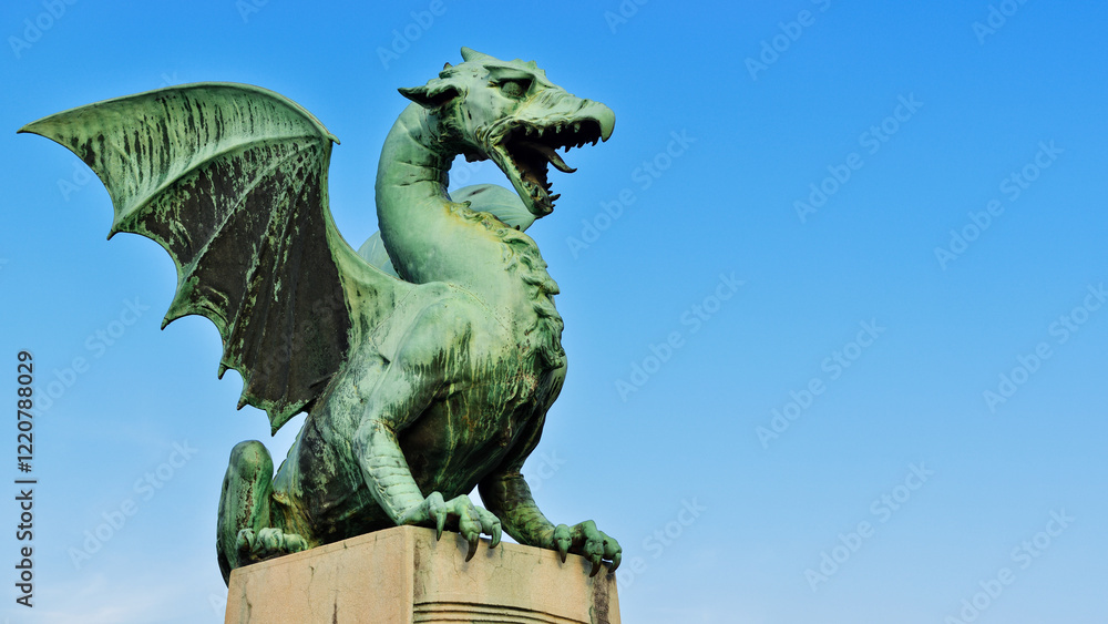 Fototapeta premium Dragon Statue on the Dragon Bridge. The Dragon is the Symbol of Ljubljana. Ljubljana, Slovenia