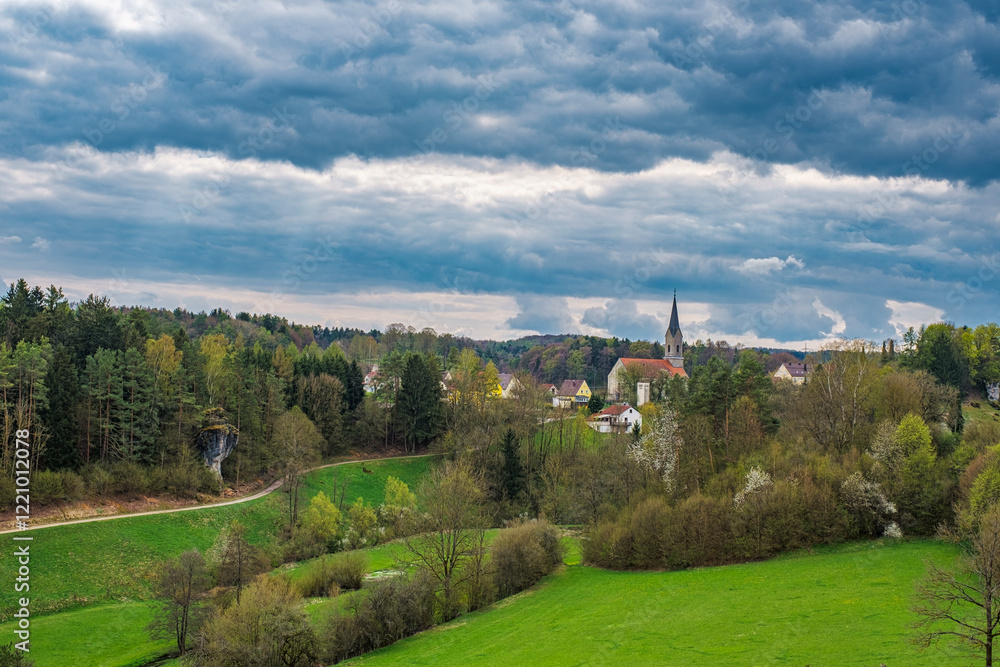 View of Thuisbrunn in Franconian Switzerland on a cloudy spring day