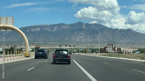 Wallpaper Mural Driving in Albuquerque New Mexico with view of Sandia Mountains, city dashcam, scenery of the american west Torontodigital.ca