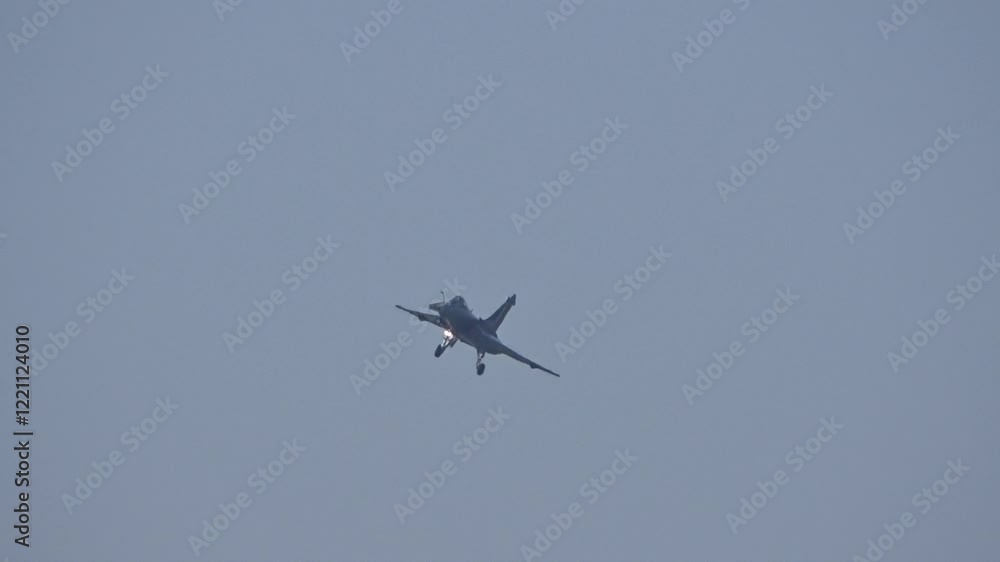 french fighter jet seen turning for final approach before landing airbase heavy combat missions technology used military aviation aircraft precision maneuvering air force tactical operations french fighter jet seen turning for final approach before landing airbase heavy combat missions technology used military aviation aircraft precision maneuvering air force tactical operations