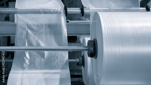 Bilde på lerret Automatic polyethylene plastic bag production machine with lighting effect