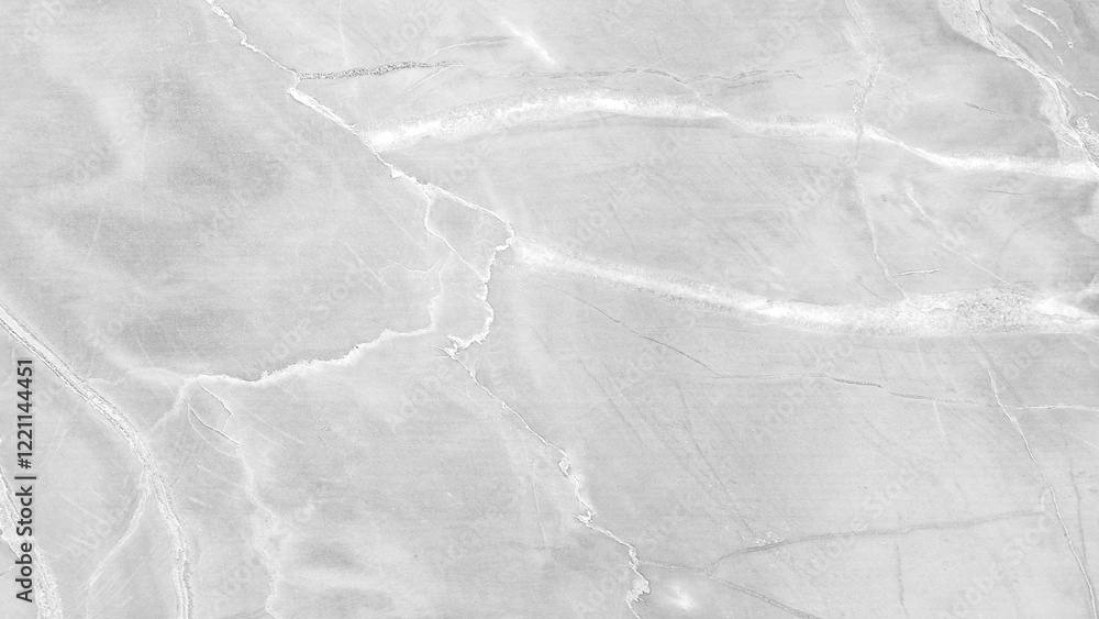 Fototapeta premium A grey stone wall with a few cracks and a few lines. white gray rough texture background as banner template
