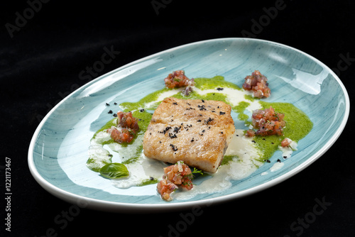 Indulge in a gourmet dish of PanSeared Fish topped with a Fresh Herb Sauce and beautiful Garnishes. 45 view