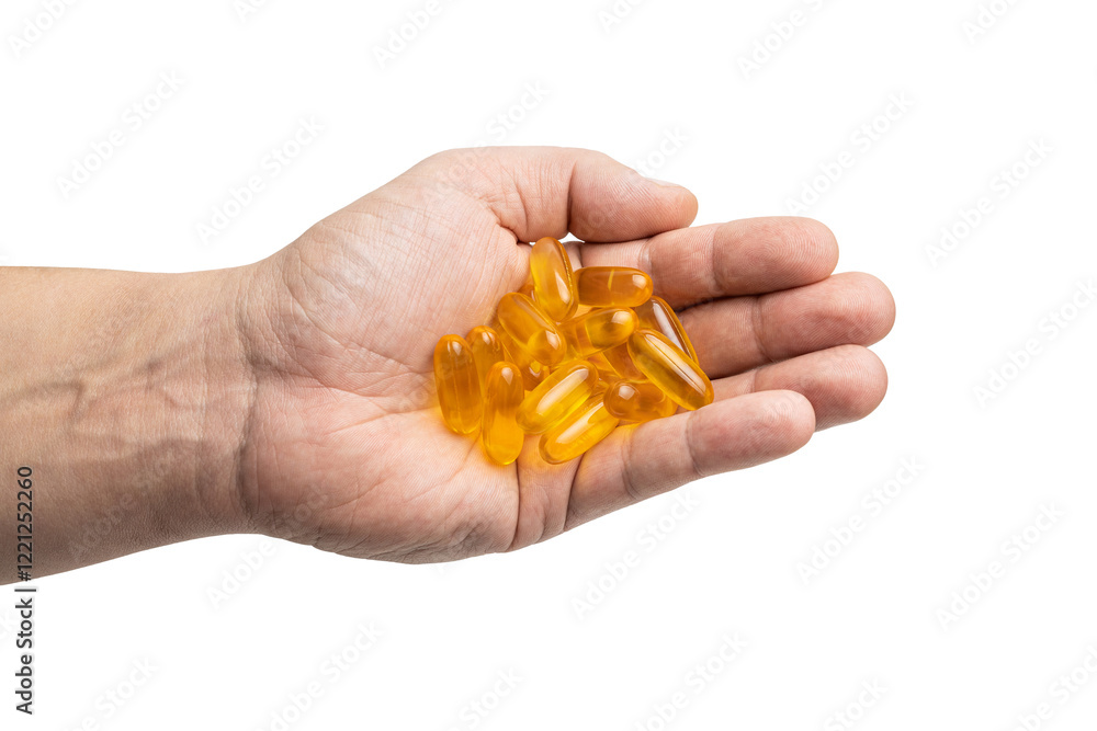 Male hand holding a pile of yellow omega-3 capsules in a palm, fatty acid, fish oil supplements, isolated on transparent background Male hand holding a pile of yellow omega-3 capsules in a palm, fatty acid, fish oil supplements, isolated on transparent background