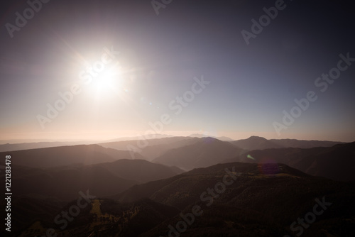 Wallpaper Mural Sun shining on a beautiful mountain landscape on top of a hike trip in Girona, Catalonia Torontodigital.ca