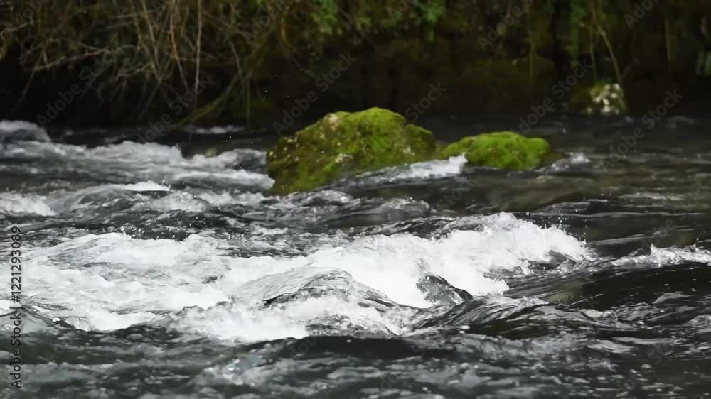 Cascade on mountain stream close up, clear water Cascade on mountain stream close up, clear water