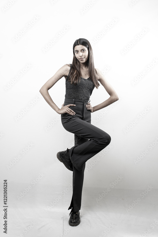 a tall slim caucasian female model with black hair wearing a black suit posing for a model shoot a tall slim caucasian female model with black hair wearing a black suit posing for a model shoot