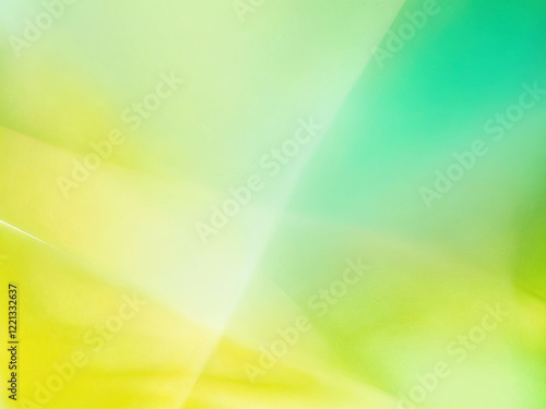Colorful abstract background blending soft yellow and green hues with fluid shapes, creating a calming visual effect