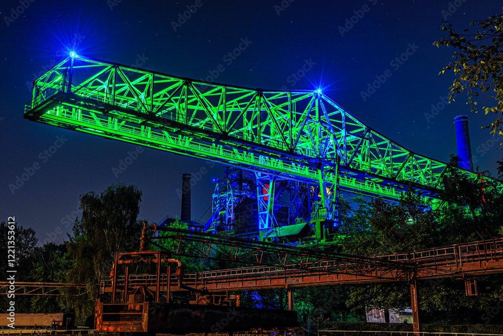 Illuminated part of the ruin of steelmill in the Landschaftspark Duisburg-Nord Illuminated part of the ruin of steelmill in the Landschaftspark Duisburg-Nord
