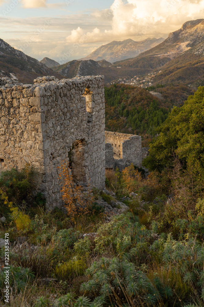 fantasy magic door in a stone wall of a castle at sunset. fantasy magic door in a stone wall of a castle at sunset.