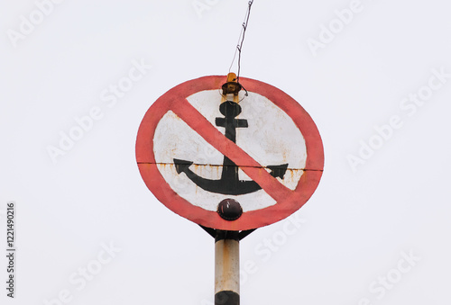 A photograph of a round red prohibitory sign 