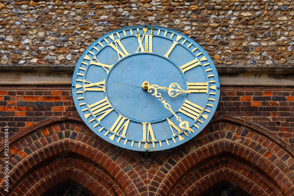 The Clock on St. Marys Church in Hitchin, Hertfordshire The Clock on St. Marys Church in Hitchin, Hertfordshire
