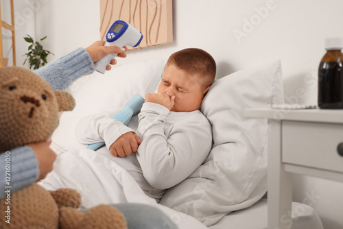 Mother taking care of her s...